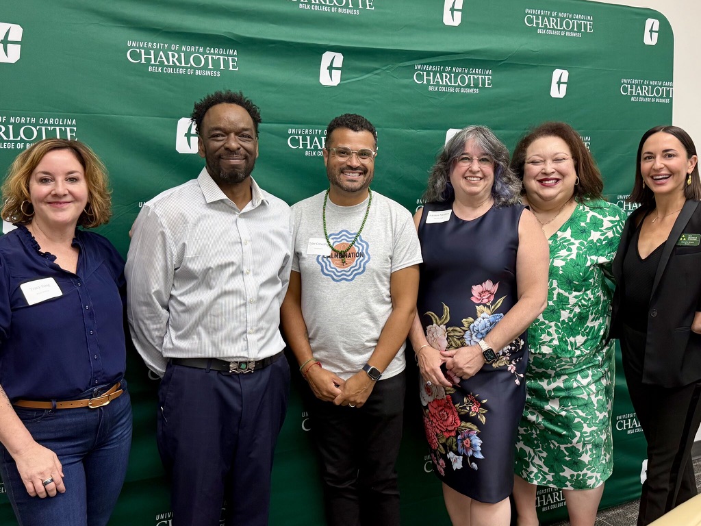Tyler with community partners at UNC Charlotte Belk College of Business